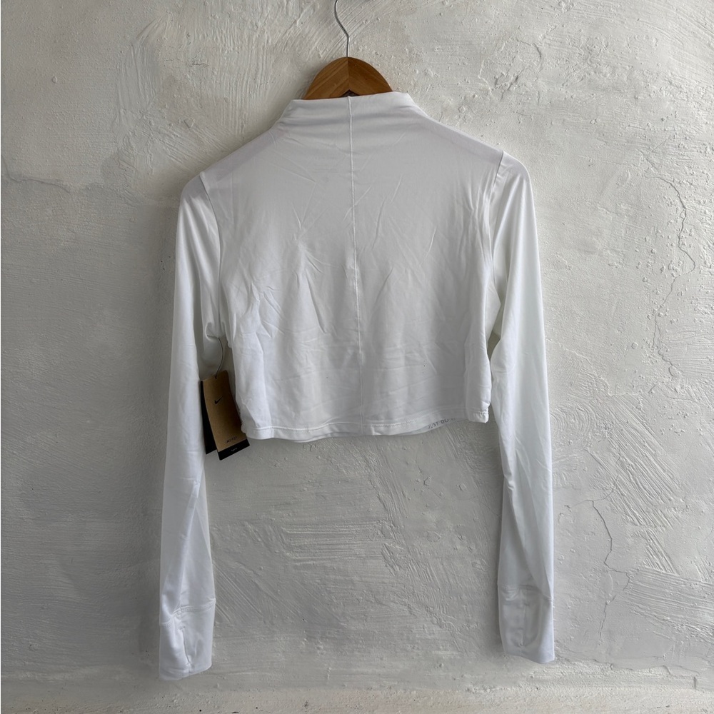 white Nike Dri-FIT One Luxe
Women's Long-Sleeve Cropped Top - Picture 7 of 12